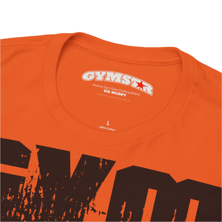 A orange Gymstar workout t-shirt with a black graphic that reads 'GYM i want you', and logo, presumably bodybulding or fitness. Logo Close up view.