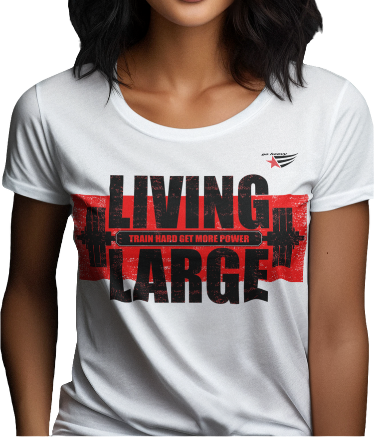 A woman wearing Gymstar white t-shirt, designed for heavy workout enthusiasts. The chest features a large, distressed print depicting a barbell and motivational text. The "LIVING LARGE" text is a standout red color, and the "TRAIN HARD GET MORE POWER" message makes it a perfect choice for weightlifting and gym training.