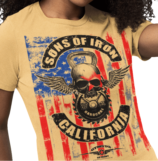 A woman wearing black Gymstar tee with a red, blue and black graphic that reads 'Sons Of Iron', skull-kettlebell, barbell and logo, presumably bodybulding or fitness.