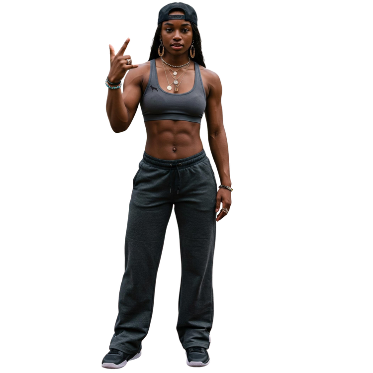 Person wearing a gray sports Fitbull bra and pants on a white background