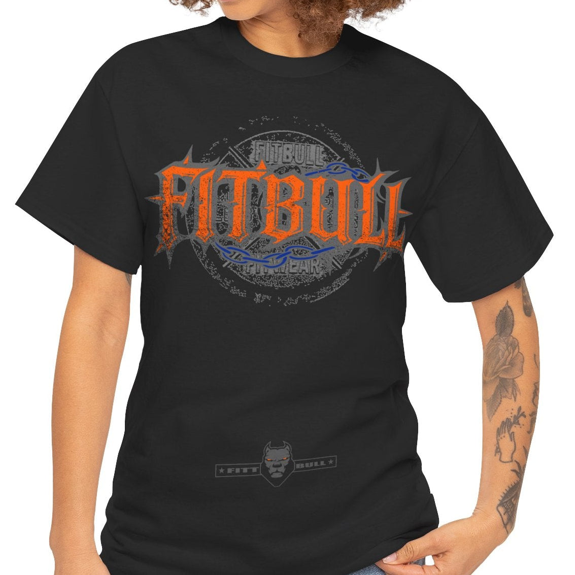 Woman wearing a black t-shirt with 'FITBULL' text in yellow and white.