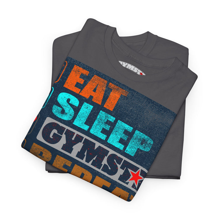 A folded dark gray t-shirt with a colorful graphic print reading 'EAT SLEEP GYMSTYPER' in orange, teal, and white distressed lettering, shown on a plain white background.