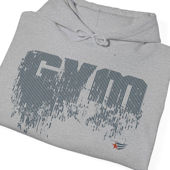 A folded light gray heather hoodie with a distressed dark gray 'GYM' graphic on the front and a small orange and blue logo near the lower right front, shown on a plain white background.