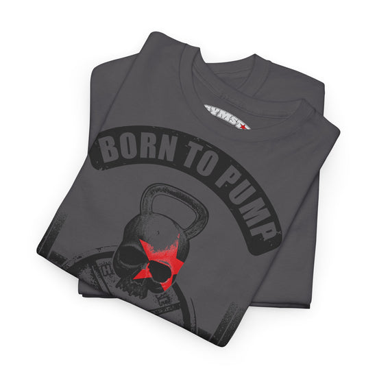 A dark gray folded t-shirt featuring a graphic of a skull wearing a red star on a kettlebell, with the text 'BORN TO PUMP' in a black arched banner above it. The shirt is displayed on a clean white background.