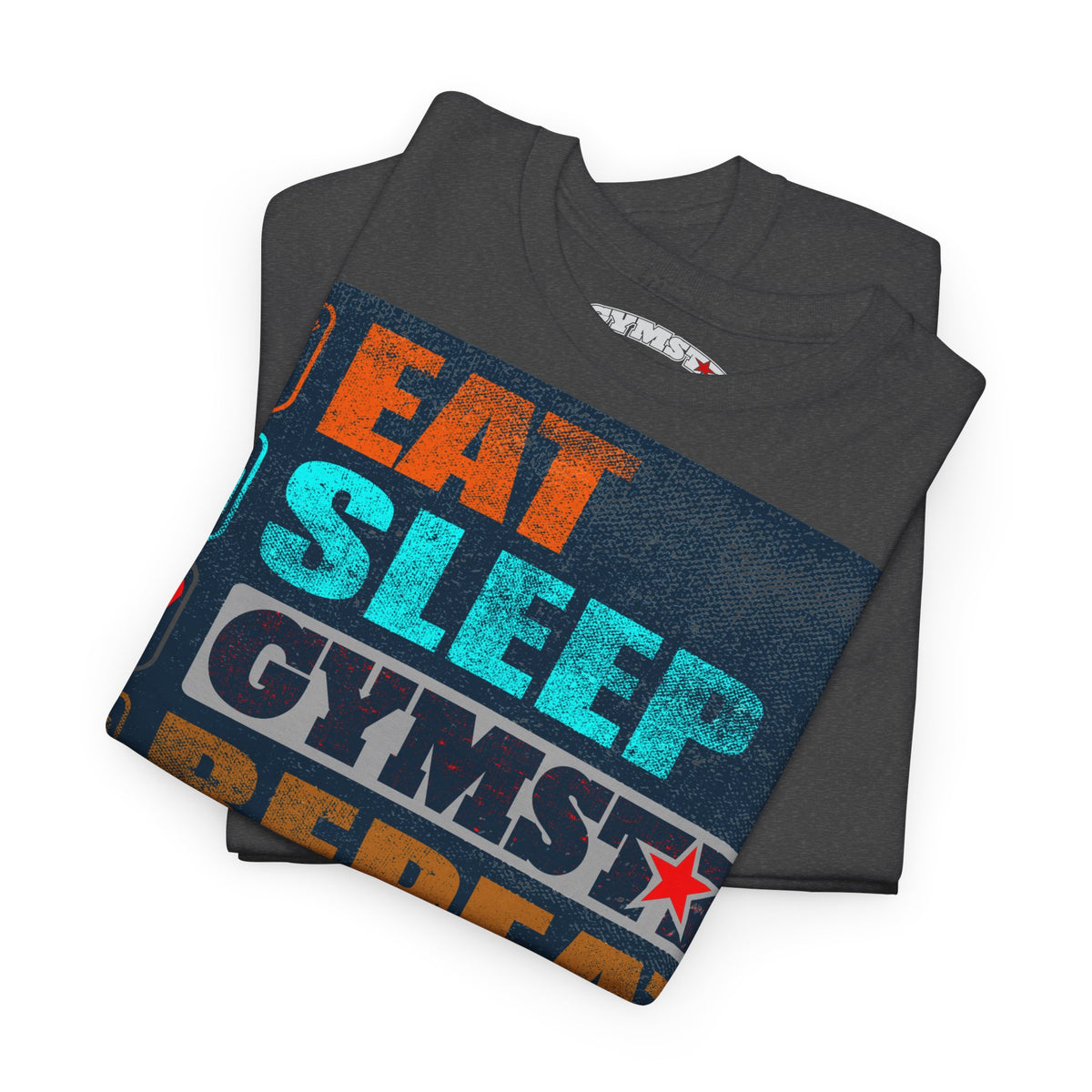 A folded dark gray t-shirt with a colorful graphic print reading 'EAT SLEEP GYMSTRE' in orange, teal, and white text, displayed on a clean white background.