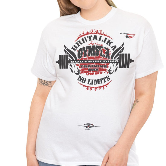 A woman modeling a white short-sleeve graphic t-shirt with a red and black gym-themed circular print on the front, paired with blue jeans, against a plain white background.