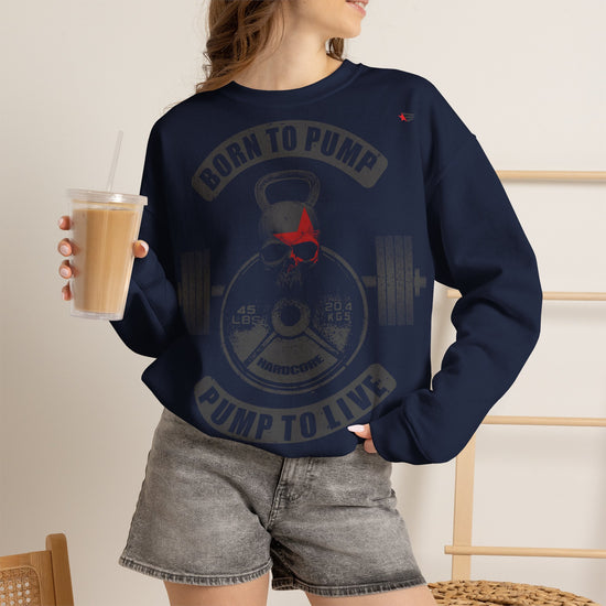 Person wearing a black sweatshirt with a red and white logo, holding a drink.
