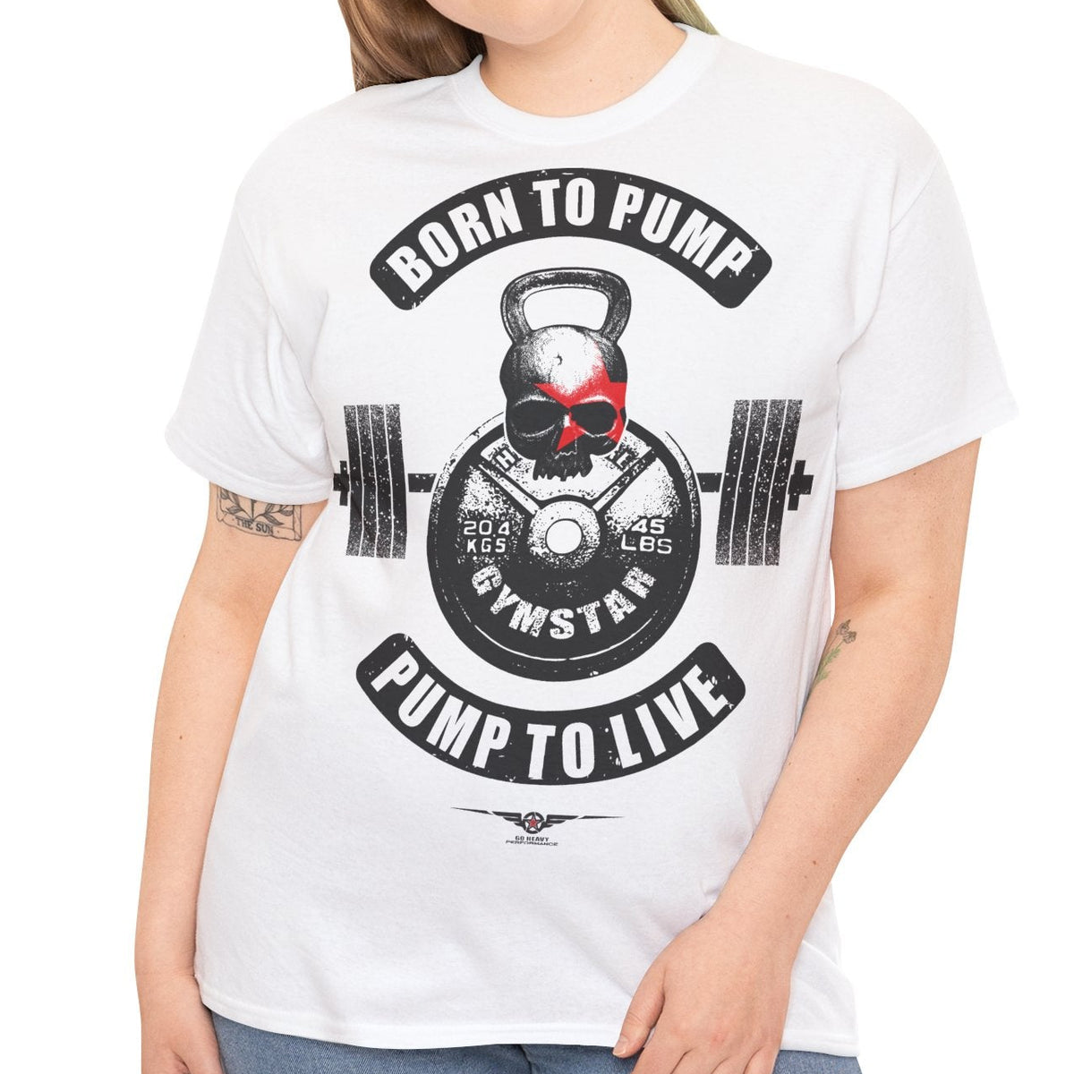 A woman modeling a white short-sleeve graphic t-shirt with a black and red gym-themed print that reads 'BORN TO PUMP' and 'PUMP TO LIVE'.