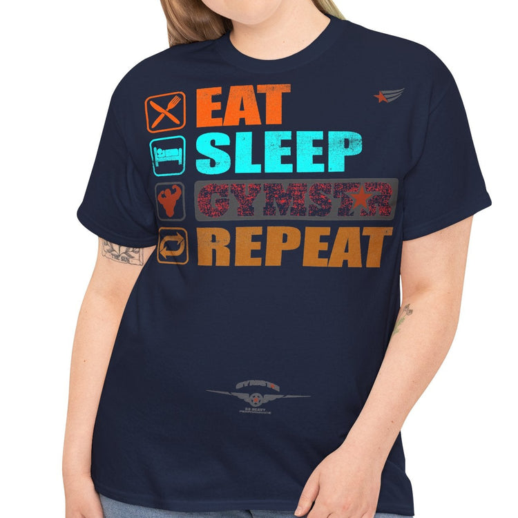 A woman modeling a navy blue t-shirt with a colorful graphic that reads 'EAT SLEEP CYBERSPACE REPEAT' in orange, teal, and red block letters, paired with light blue jeans against a plain white background.
