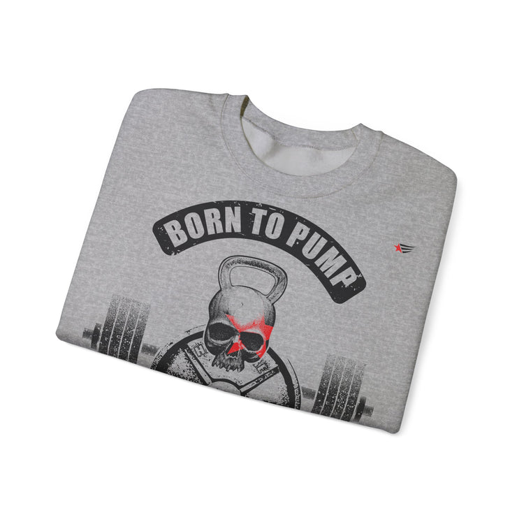 A folded heather gray crewneck sweatshirt featuring a graphic print of a skull wearing red sunglasses with a kettlebell and barbell, under a black banner that reads 'BORN TO PUMP'.