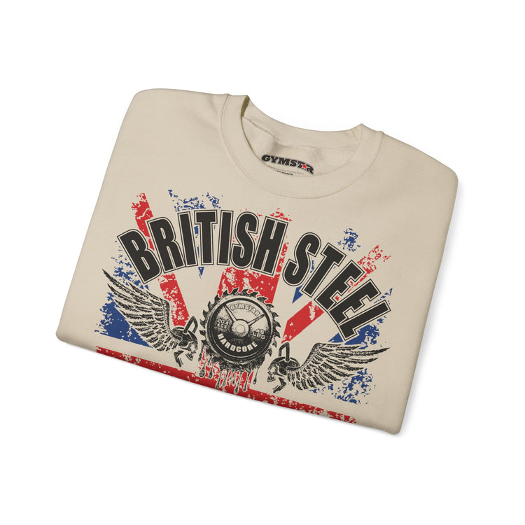 A folded cream-colored Gymster t-shirt featuring a distressed graphic with the words 'BRITISH STEEL' in black, a central gear emblem, and a Union Jack flag design in red, white, and blue.