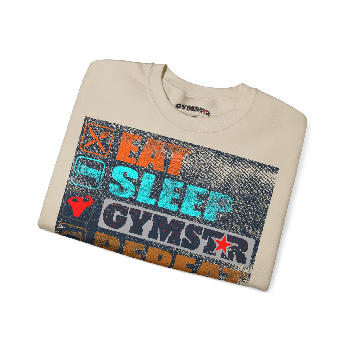 A folded beige crewneck t-shirt with a distressed graphic print on the front that reads 'EAT SLEEP GYMSTAR' in orange, teal, and white, with a gym star logo. The brand name 'GYMSTAR' is visible on the inner neck label and within the graphic.