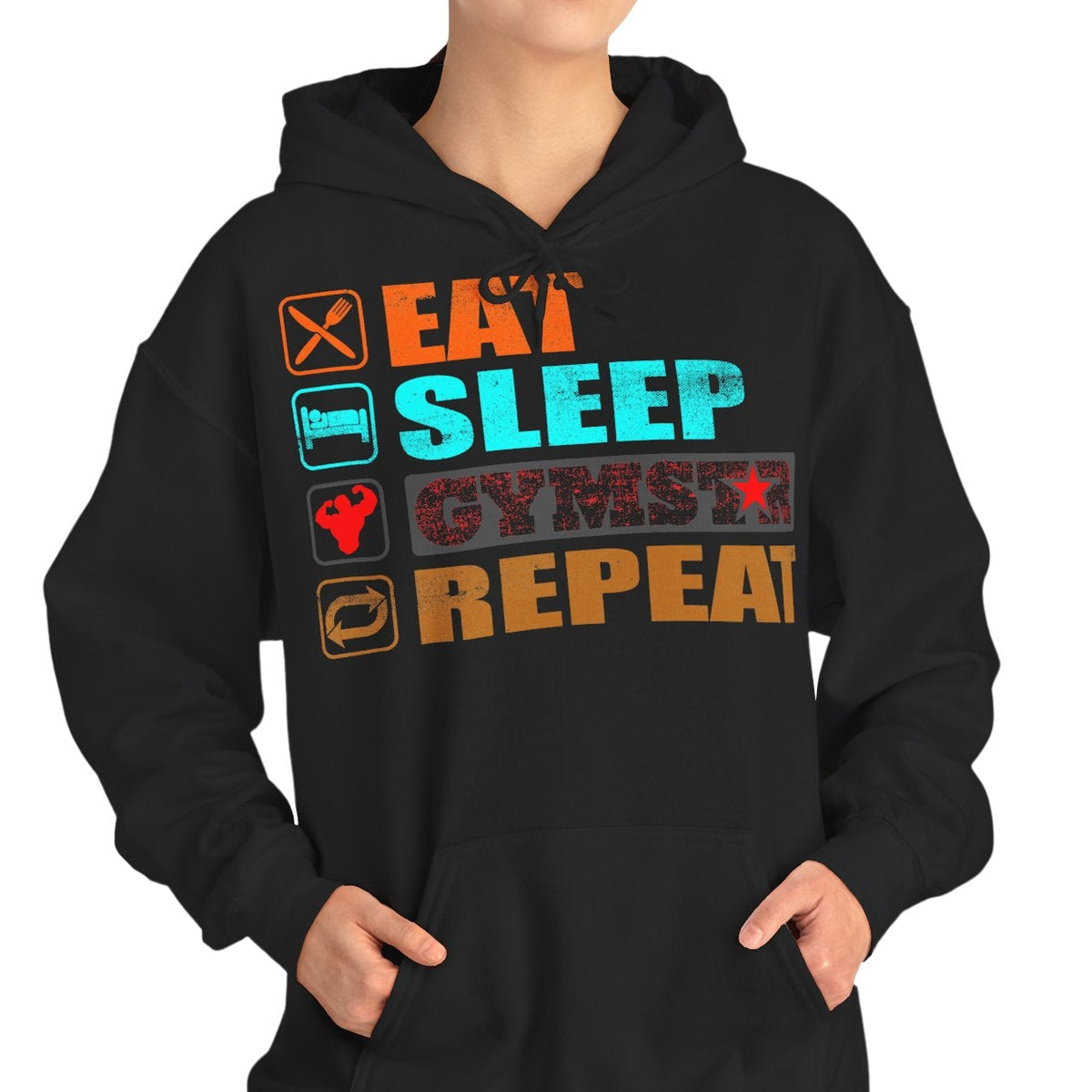 A woman modeling a black hoodie with a colorful graphic text design on the chest that reads 'EAT SLEEP GYM ROSTER' with small icons next to each word, against a plain white background.