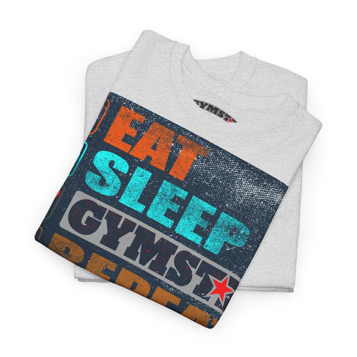 A folded light gray t-shirt with a colorful graphic print reading 'EAT SLEEP GYMSTREAKER' in orange, teal, and dark gray text, on a white background.