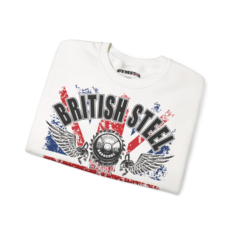 A folded white crewneck sweatshirt featuring a distressed graphic print with the words 'BRITISH STEEL' in black over a red, white, and blue Union Jack design, with wings and a central circular emblem. The brand name 'GYMMASTER' is visible on the inner neck label.