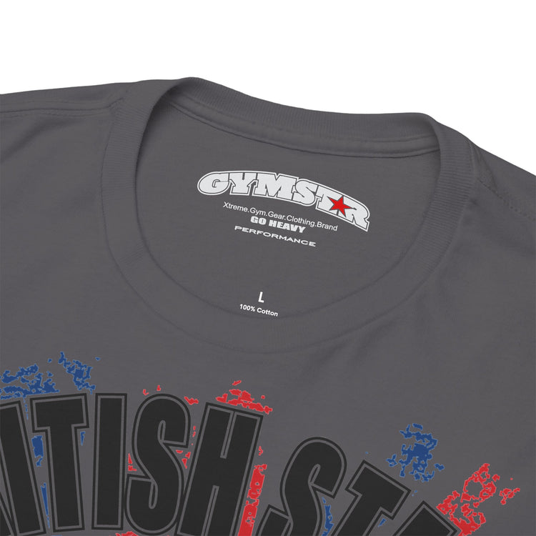 Close-up of a dark gray t-shirt showing the inner neck label with 'GYMSTAR' and '60 HEAVY' branding, and the top of a graphic print with distressed red and blue lettering on a white background.