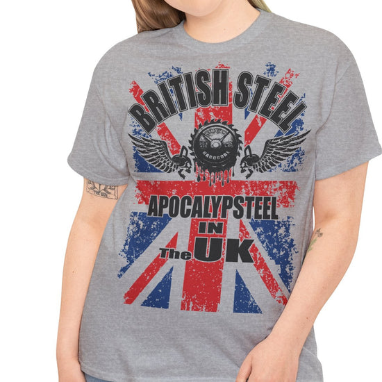 A woman modeling a heather gray graphic t-shirt featuring a distressed Union Jack design with the text 'BRITISH STEEL' and 'APOCALYPSTER! IN THE UK'.