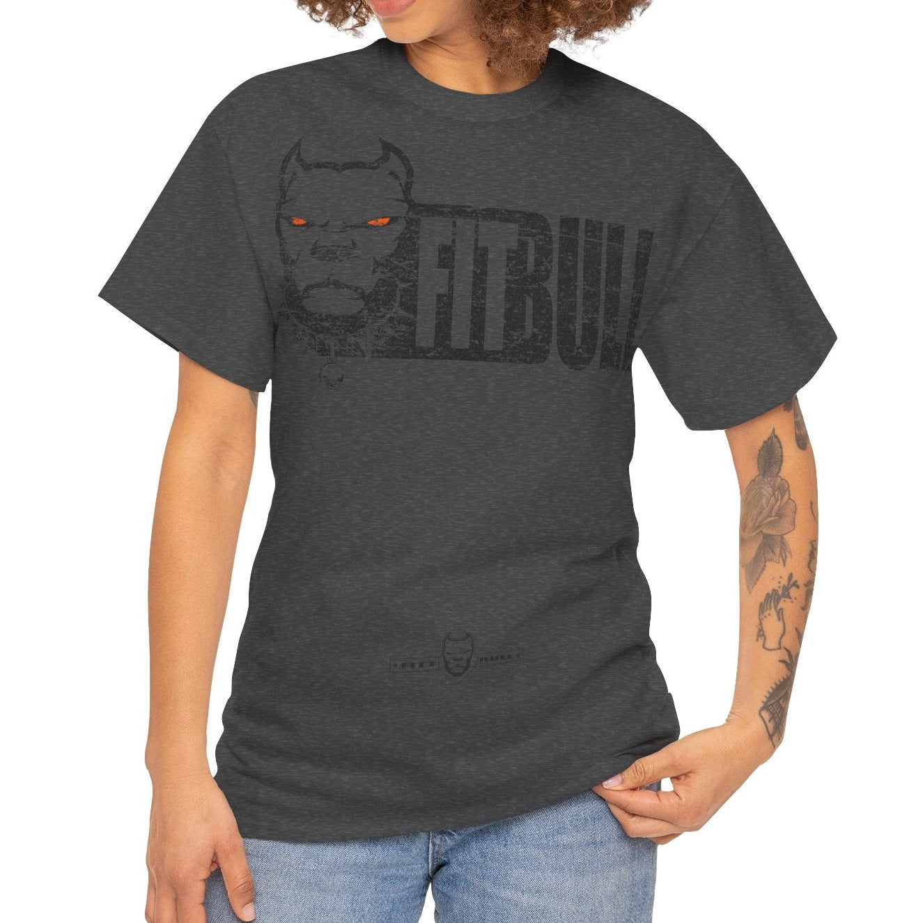 Woman wearing a dark gray Fitbull t-shirt on a white background