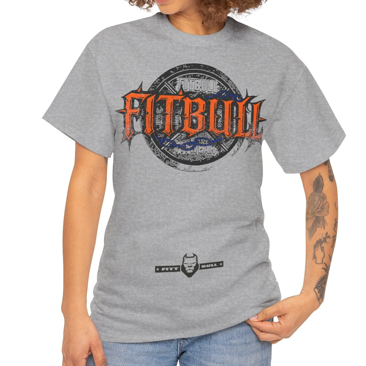 Woman wearing a gray t-shirt with 'Fitbull' logo on a white background