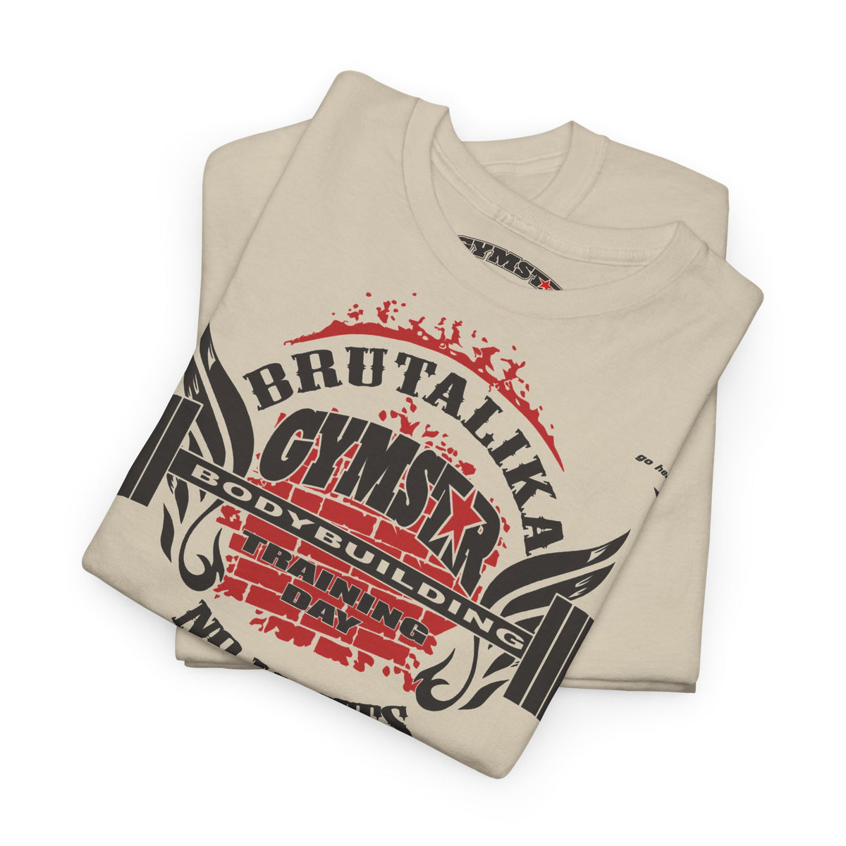 A folded beige t-shirt with a graphic print reading 'BRUTALIKA GYMSTAR BODYBUILDING TRAINING DAY' in black and red, set against a plain white background.