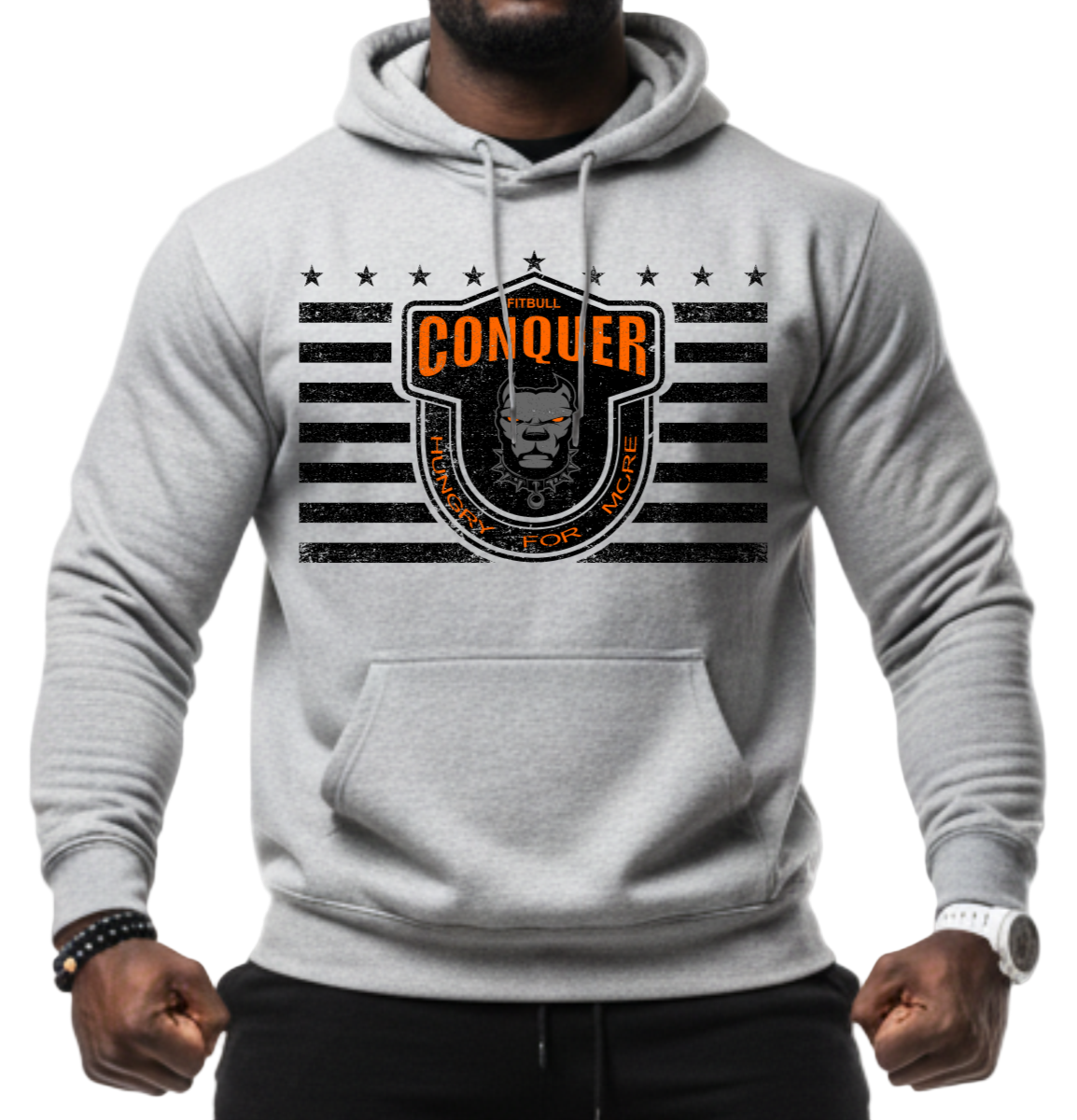 Man wearing a grey Fitbull sporty hoodie with bodybuilding motivating design Conquer with orange accents.