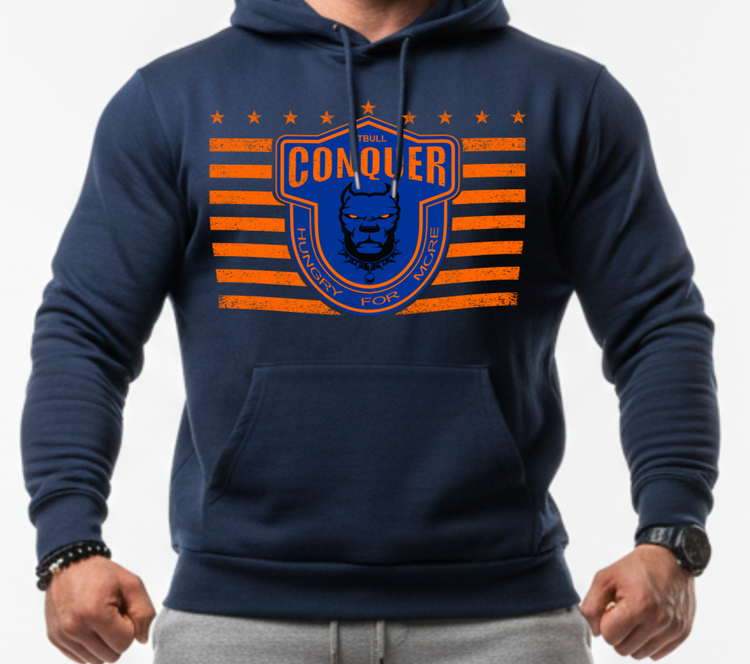 Man wearing a navy Fitbull sporty hoodie with bodybuilding motivating design Conquer with orange accents.
