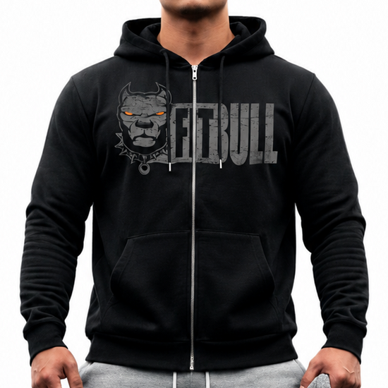 Man wearing a black Fitbull hoodie with a logo and text, gray sweatpants, and red sneakers on a white background