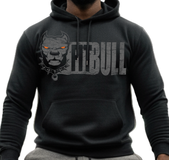 Person wearing a black hoodie with 'Fitbull' branding in a gym setting