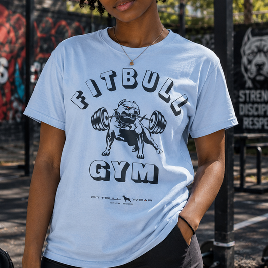 Person wearing a Fitbull Gym t-shirt in an outdoor setting