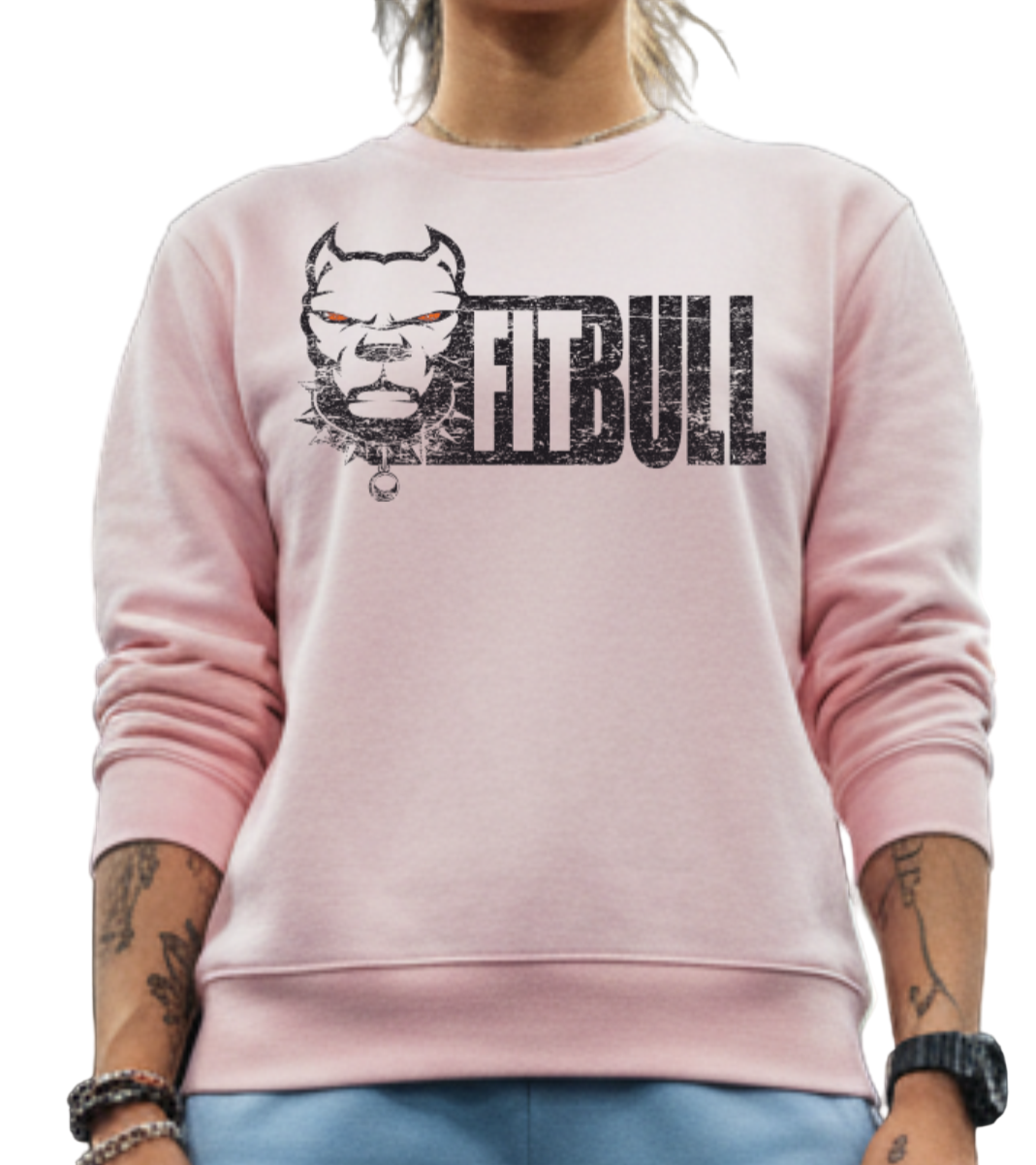 Person wearing a sporty pink sweatshirt with 'FitBull' logo in a gym setting