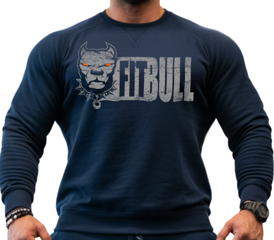 Man wearing a navy FitBull bodybuilding sweatshirt and pants in a gym setting