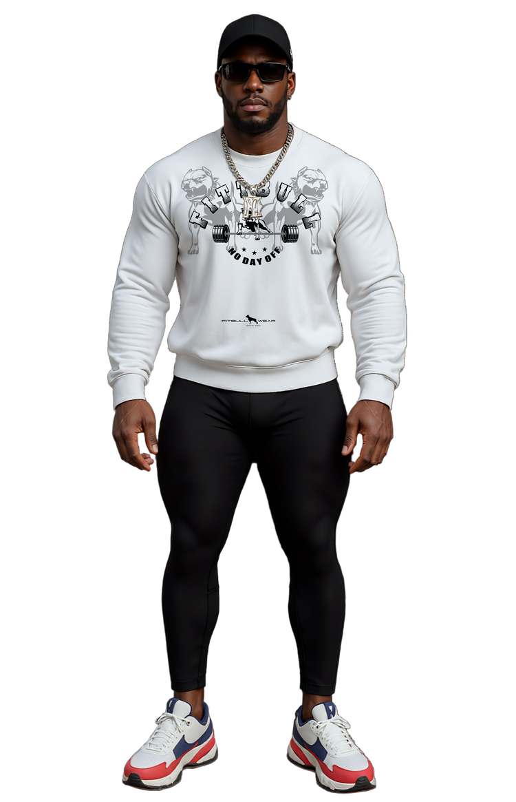 Man wearing a white sweatshirt with graphic design fitbull, no day off, black leggings, and colorful sneakers on a white background