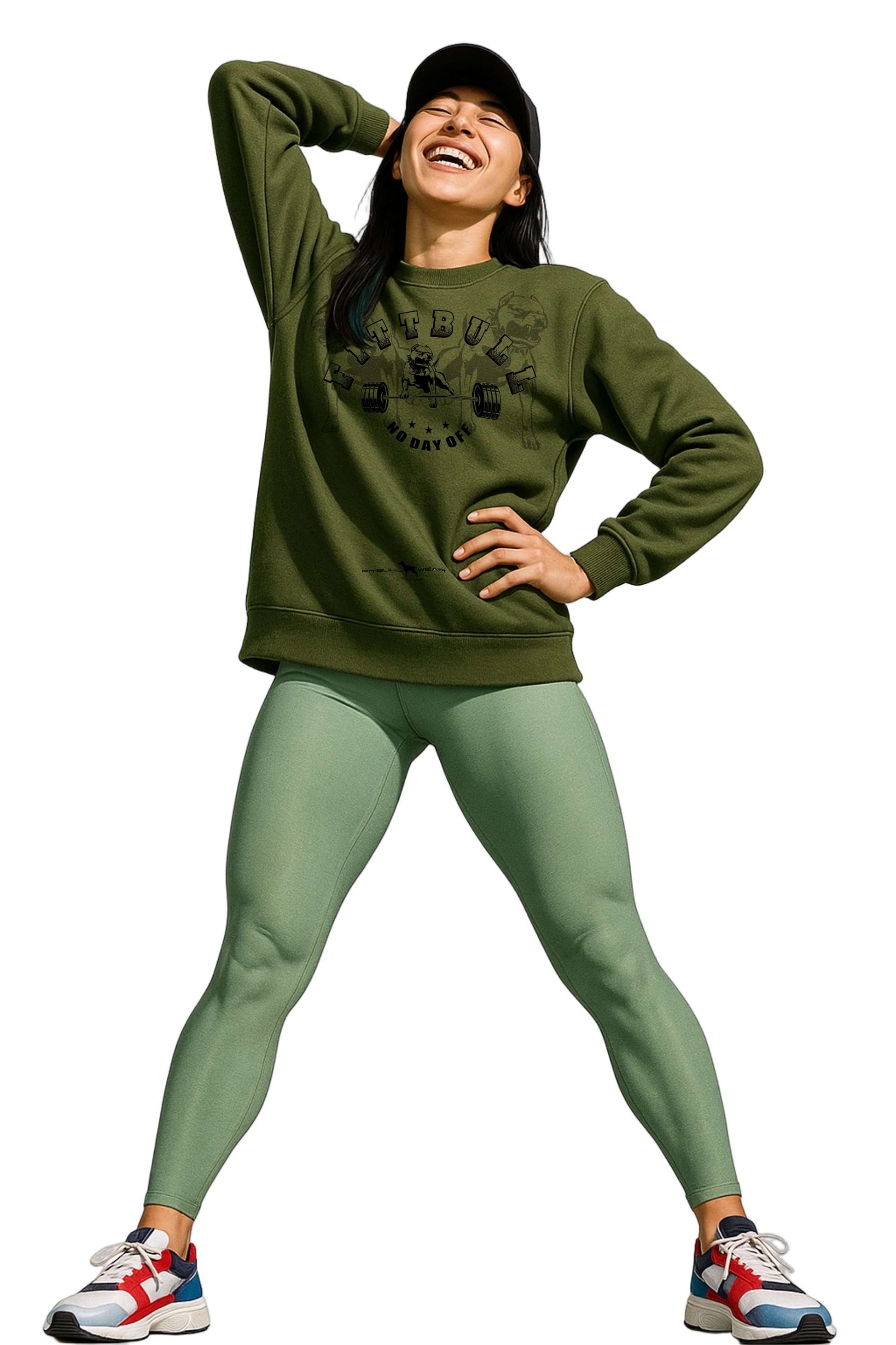 A woman wearing a green Fitbull fitness sweatshirt and leggings with a white background