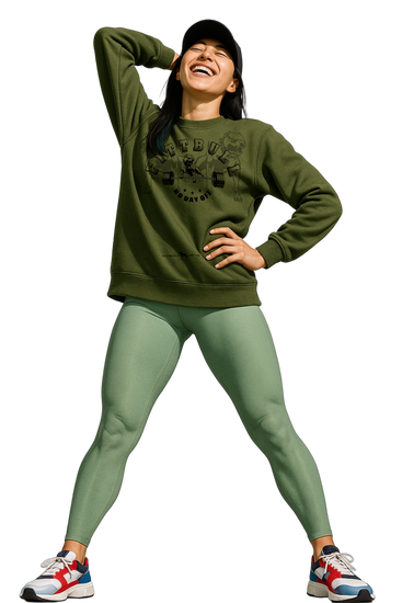 A woman wearing a green Fitbull fitness sweatshirt and leggings with a white background