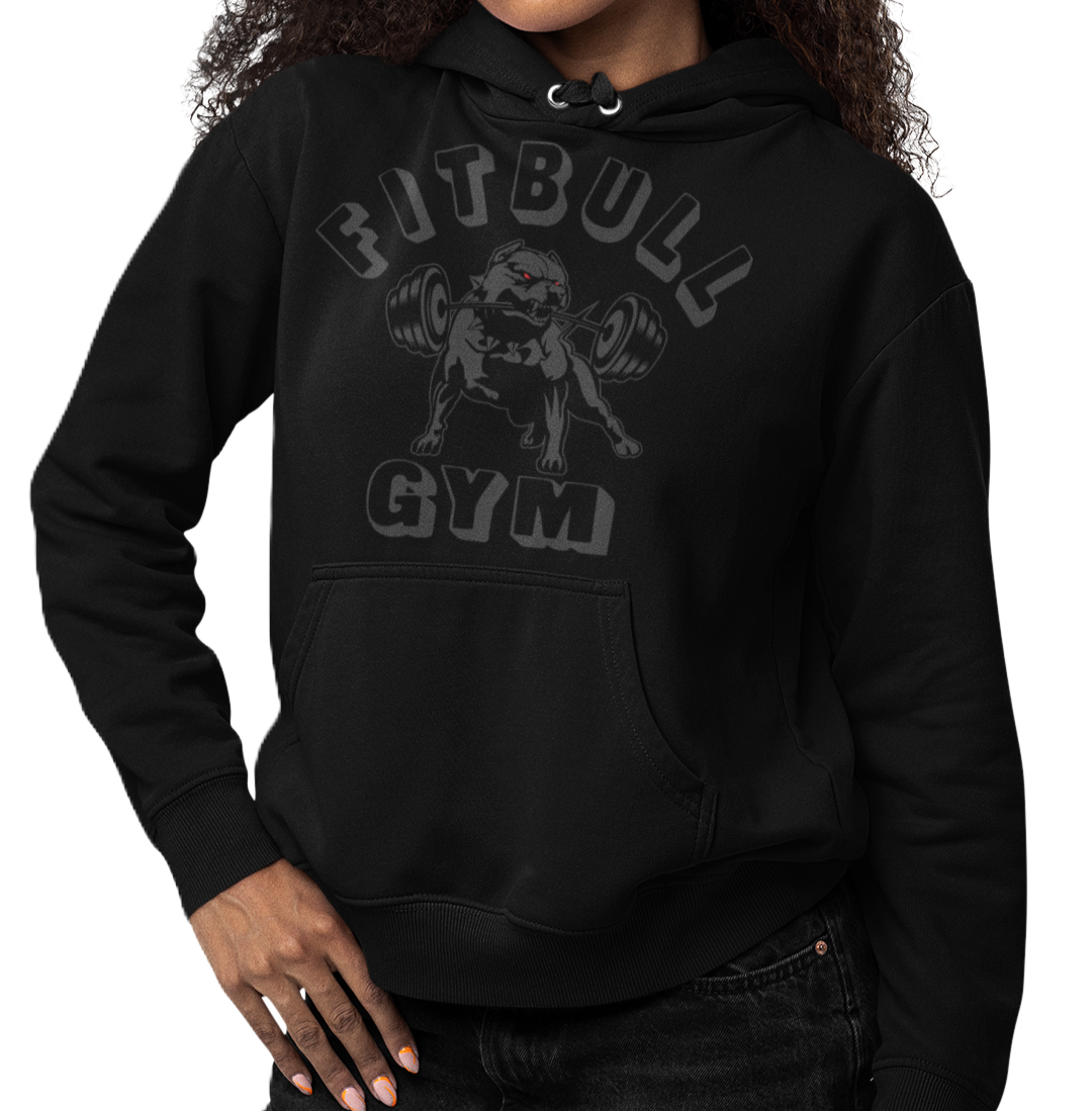 male bodybuilder with a black sports hoodie for fitness and bodybuilding of the brand Fitbull branded with a motivating motif front view