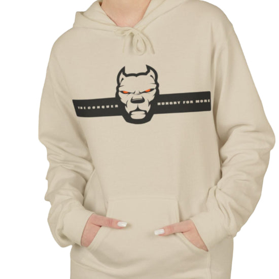 woman wearing beige sporty hoodie for fitness and bodybuilding training by the brand Fitbull, branded with a logo and a motivating motif front view