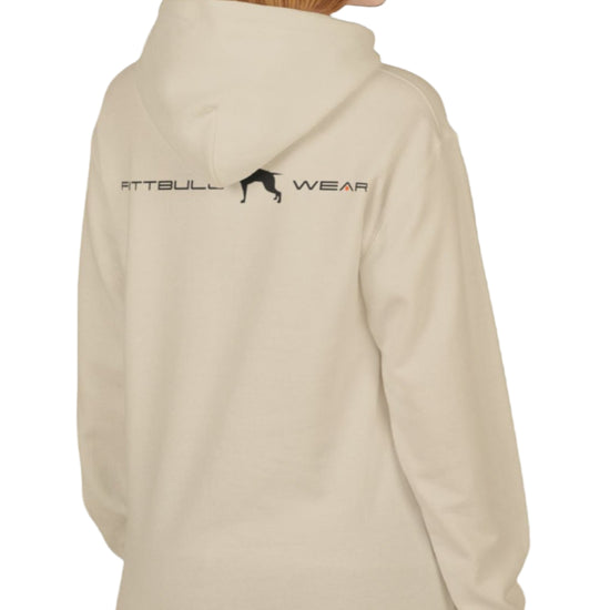 woman wearing beige sporty hoodie for fitness and bodybuilding training by the brand Fitbull, branded with a logo and a motivating motif side view