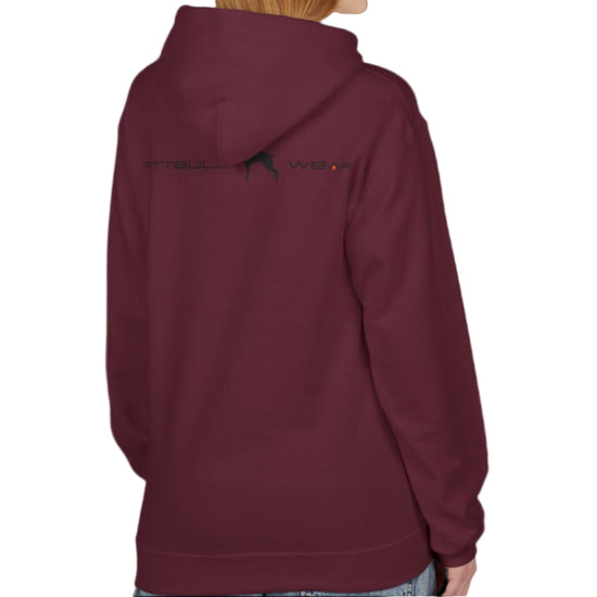 A woman wear sports rubin hoodet, fitness sweatshirt Fitbull, with motivation desighn Unleash The Beast, back view.