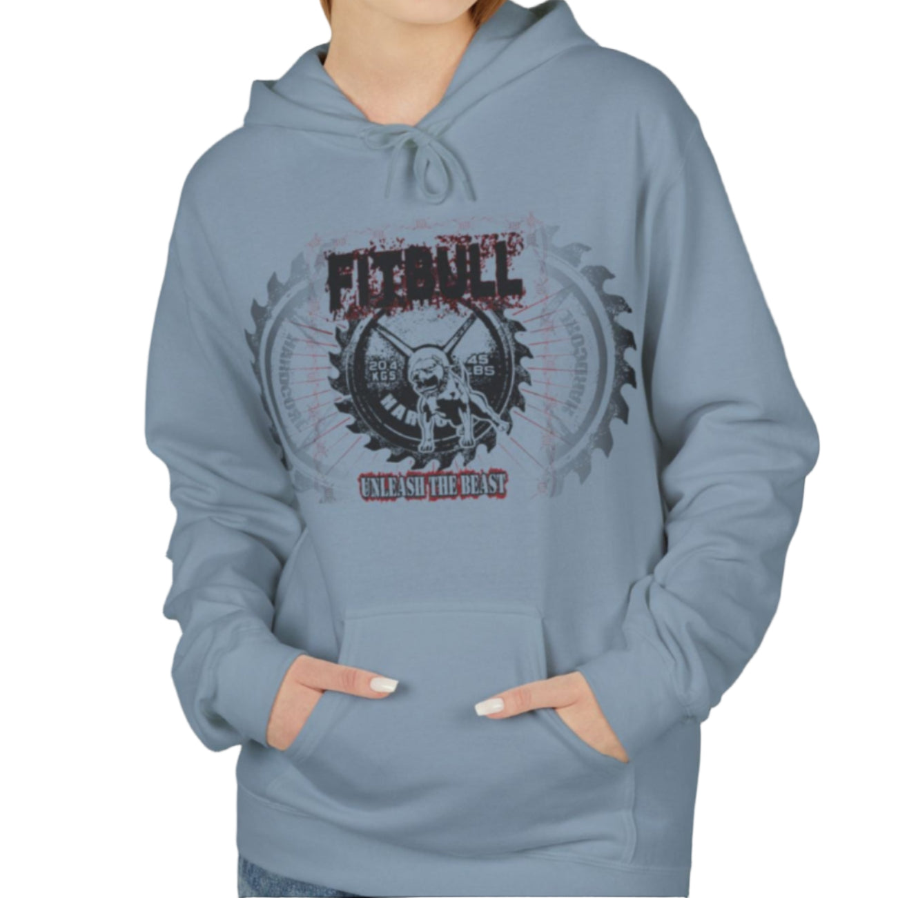 A woman wear sports light blue hoodet, fitness sweatshirt Fitbull, with motivation desighn Unleash The Beast.