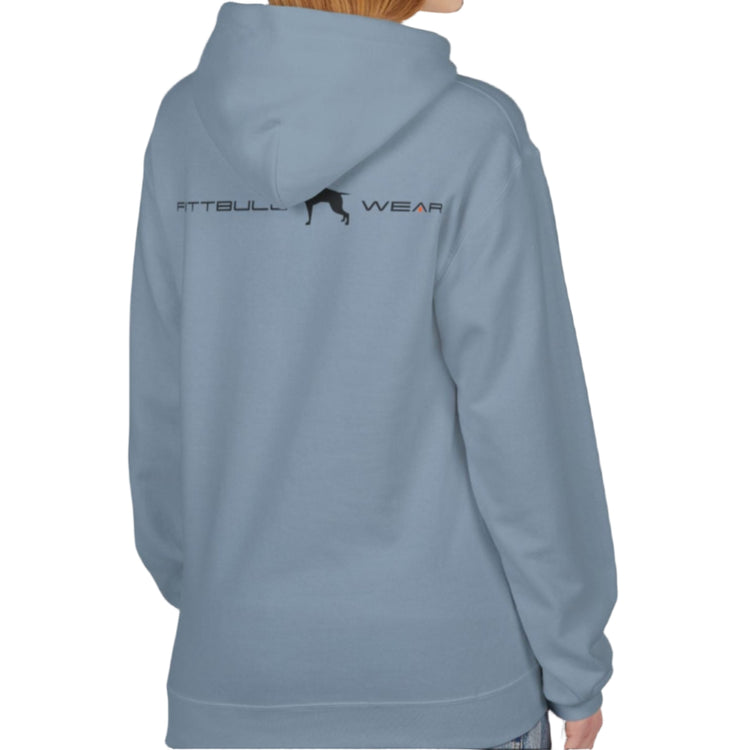 A woman wear sports light blue hoodet, fitness sweatshirt Fitbull, with motivation desighn Unleash The Beast, back view.