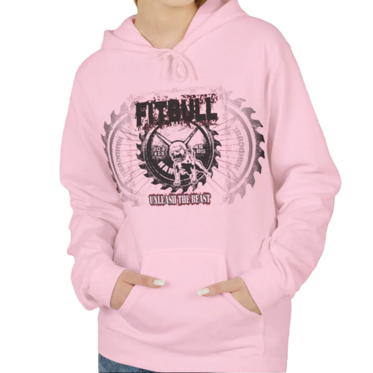A woman wear sports pink hoodet, fitness sweatshirt Fitbull, with motivation desighn Unleash The Beast.
