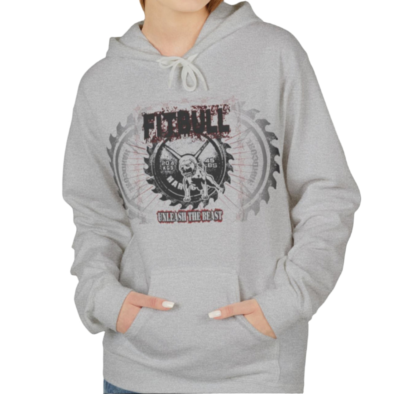 A woman wear sports silver grey hoodet, fitness sweatshirt Fitbull, with motivation desighn Unleash The Beast.