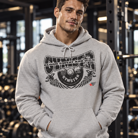 Athletic man wearing a grey GYMSTAR Blood, Sweat and Iron hoodie in a gym