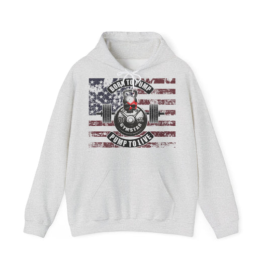 A light heather gray pullover hoodie with a distressed American flag graphic on the chest, featuring a barbell and a skull with the text 'BORN TO PUMP' and 'PUMP TO LIVE' by Pump to Live.
