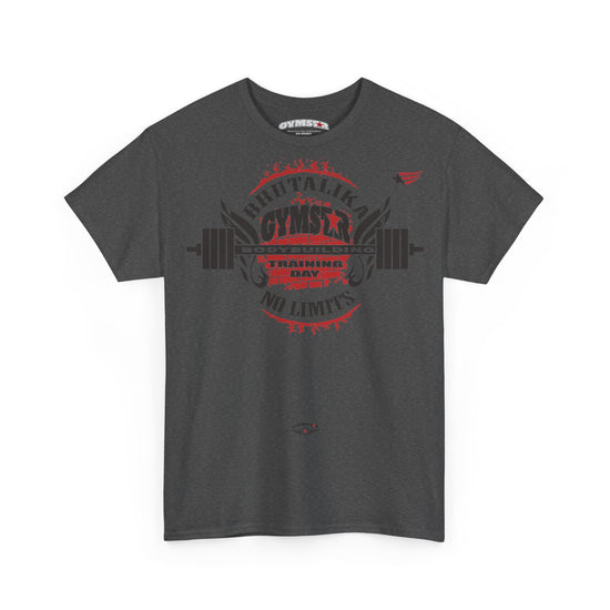 A dark heather gray crewneck t-shirt featuring a red and black graphic print on the front with a barbell, wings, and the text 'BRUTALIKA GYMSTAR'. The shirt is displayed flat against a solid white background.