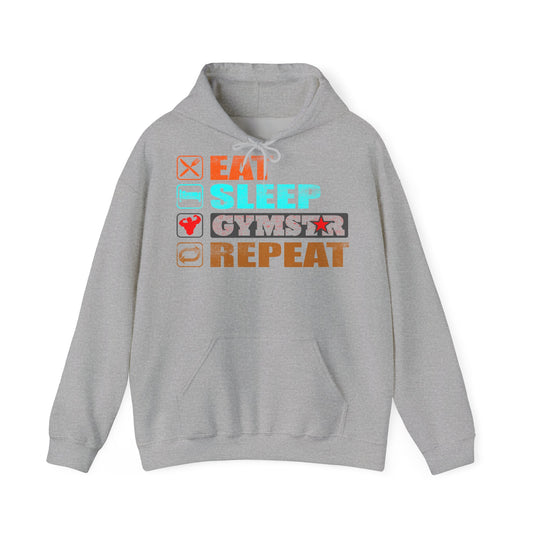 A light heather gray pullover hoodie with a graphic on the chest reading 'EAT SLEEP GYMSTAR REPEAT' in orange, teal, and dark gray, displayed on a clean white background.