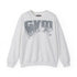 A light gray heather crewneck sweatshirt featuring a large distressed 'GYM' graphic in dark gray on the chest, with a small red and white logo on the lower right of the graphic.