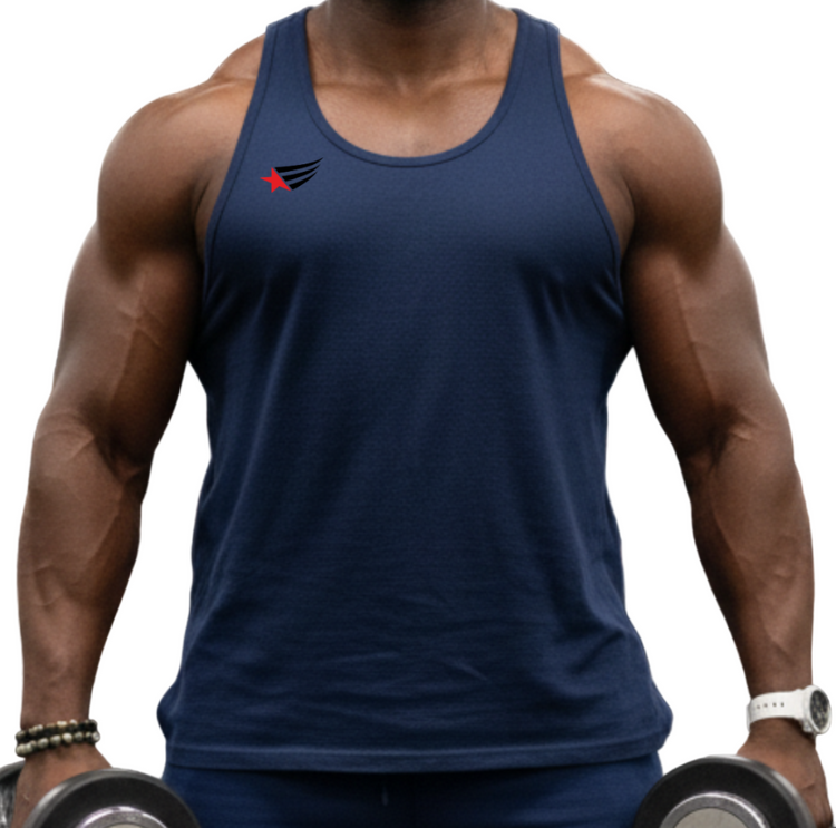 Man in a gym wearing a navy Gymstar fitness tank top and shorts, holding dumbbells.