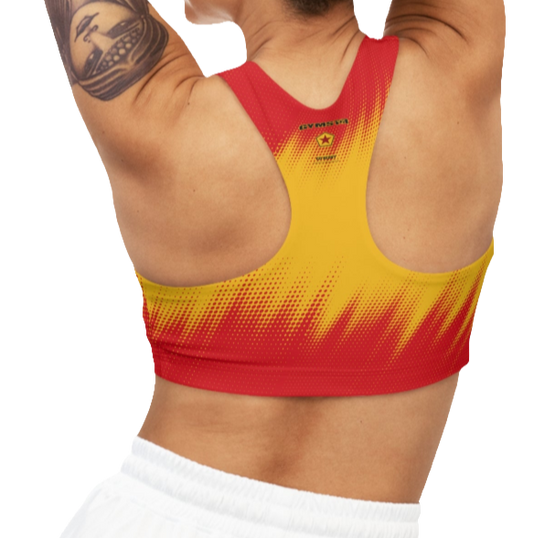 A sports bra with a red and yellow gradient design, featuring a racerback style.