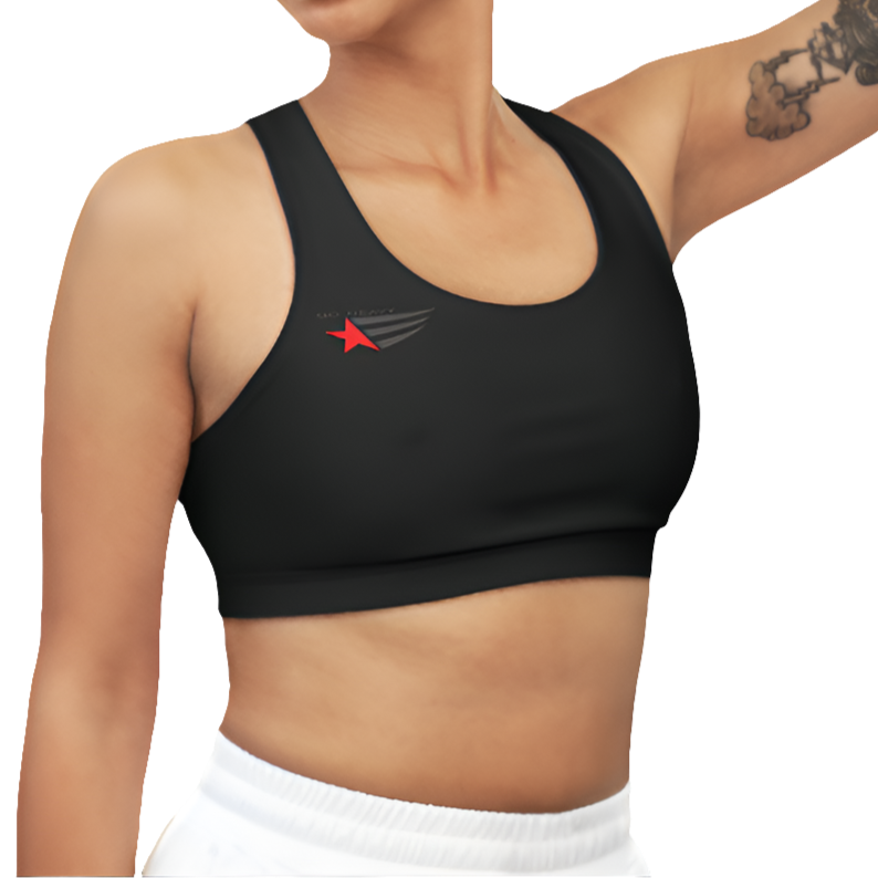 A woman wearing Black  sports, fitness bra from the Gimstar brand, with white seams and a small logo on the left side. Right side view.